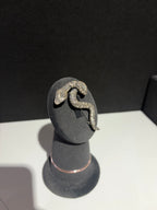 Sterling silver snake brooch with detailed floral engraving