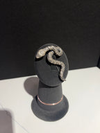 Sterling silver snake brooch with detailed floral engraving